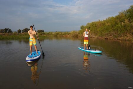 Two guys on inflatable paddleboards