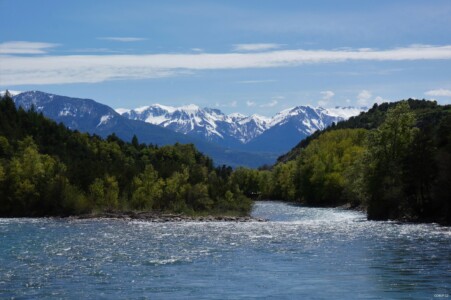 River with snowy mountains in distance