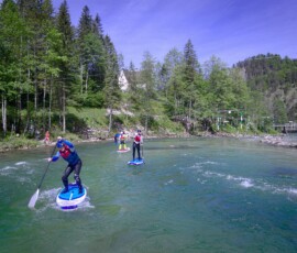 Czech team of SUP rider practising whitewater